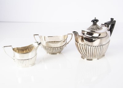 Lot 329 - A harlequin Victorian and later silver bachelor's three piece tea set