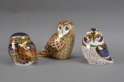 Lot 349 - Three Royal Crown Derby bone china owl paperweights