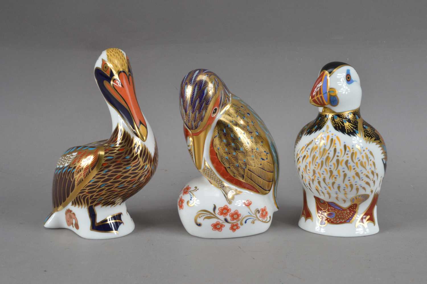 Lot 355 - Three Royal Crown Derby paperweights