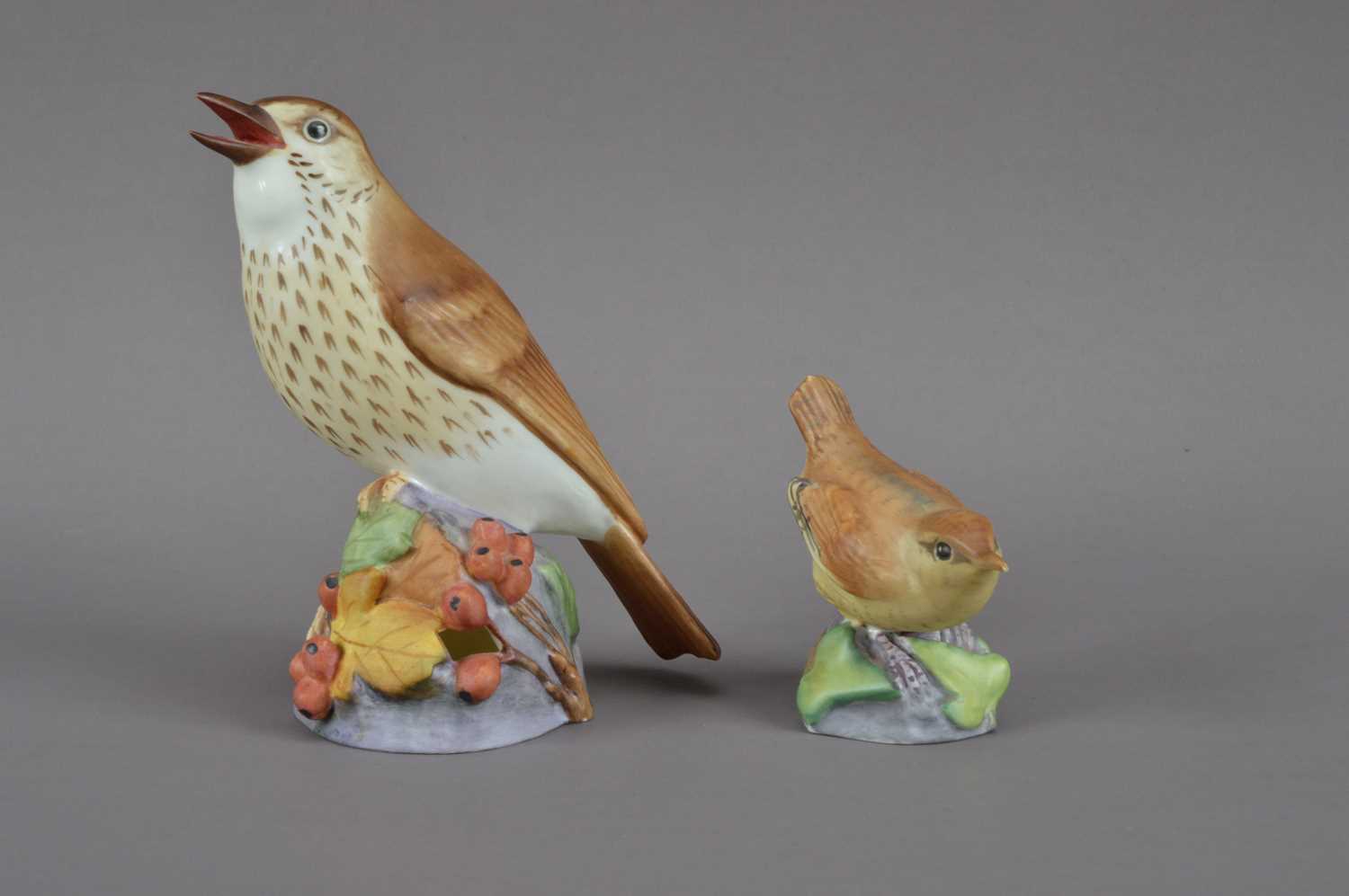 Lot 375 - Two Royal Worcester ceramic bird figurines,