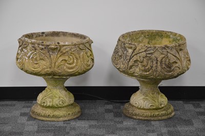 Lot 405 - A pair of re-constituted stone garden planters
