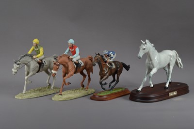 Lot 406 - Two ceramic sculptures of horses and jockeys