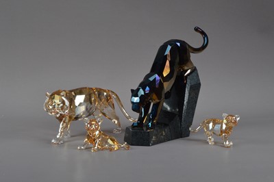 Lot 410 - A collection of Swarovski glass big cats