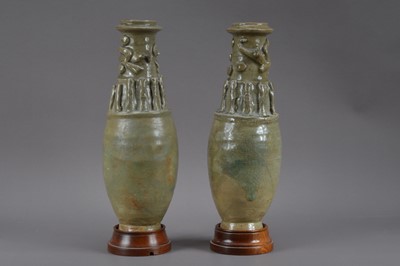 Lot 464 - A pair of Chinese celadon glazed vases