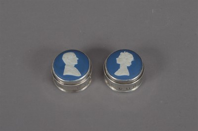 Lot 496 - A pair of Elizabeth II silver circular trinket boxes with Wedgwood Jasperware ceramic covers